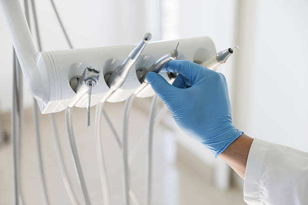 Professional Teeth Whitening technician working in Poquott, NY